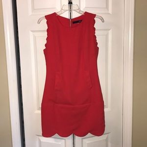 Boutique cocktail dress with scalloped detail